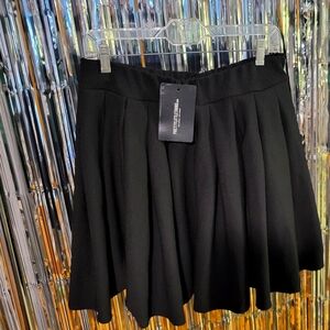 Black Pleated Mini skirt Pretty Little Things